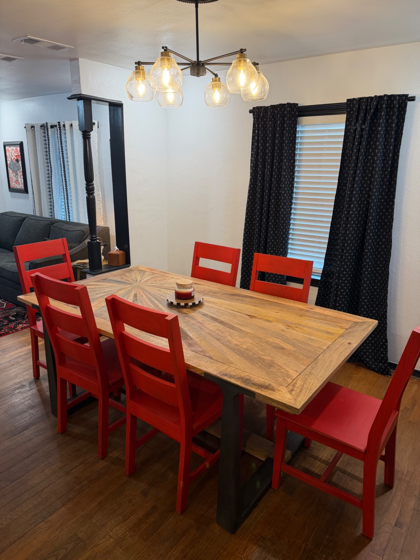 Front of the teal 28th Street house with a walkway to the porch — Dining room