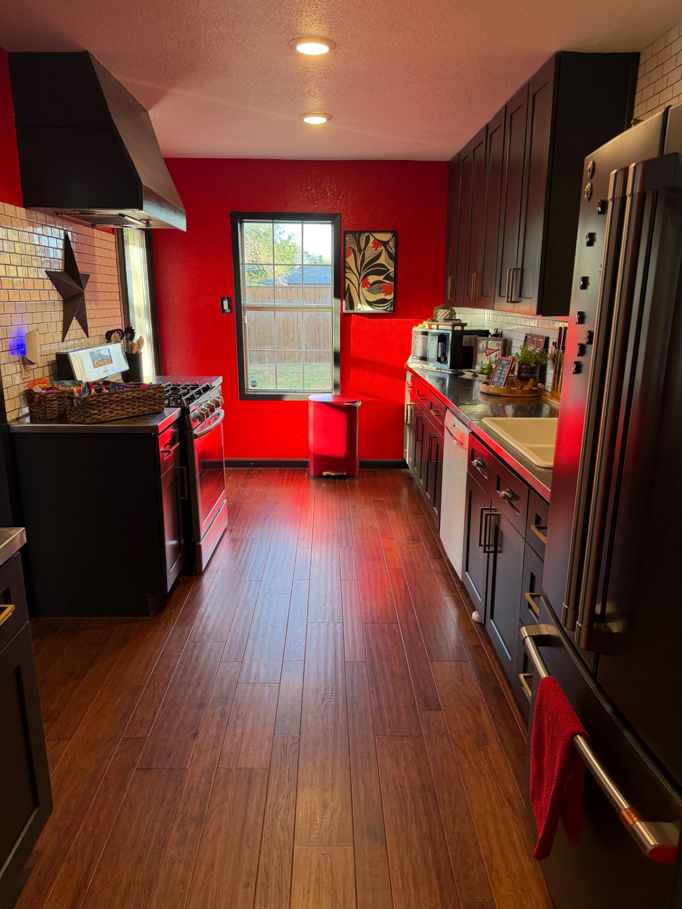 Front of the teal 28th Street house with a walkway to the porch — Kitchen