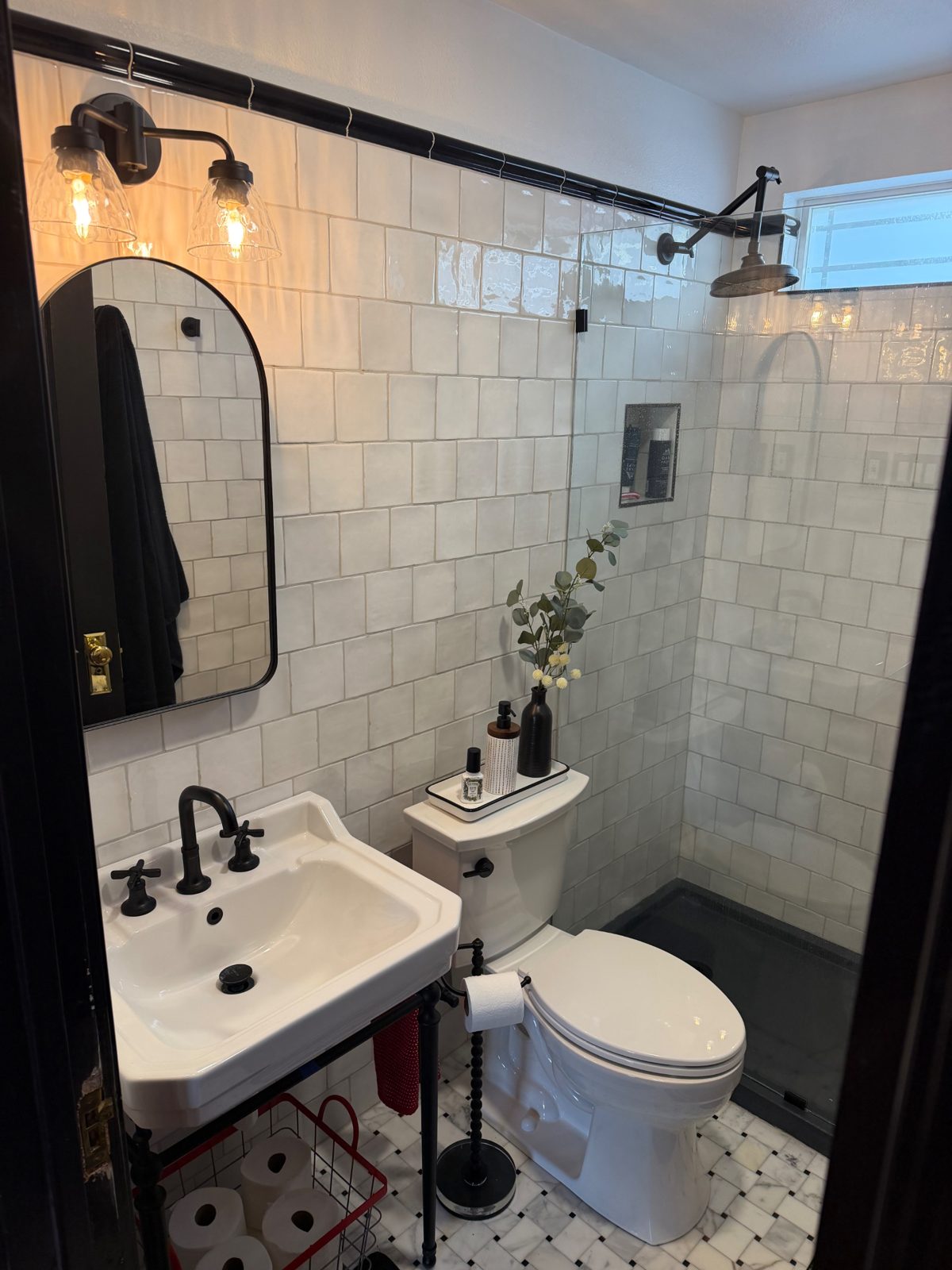 Front of the teal 28th Street house with a walkway to the porch — Bathroom