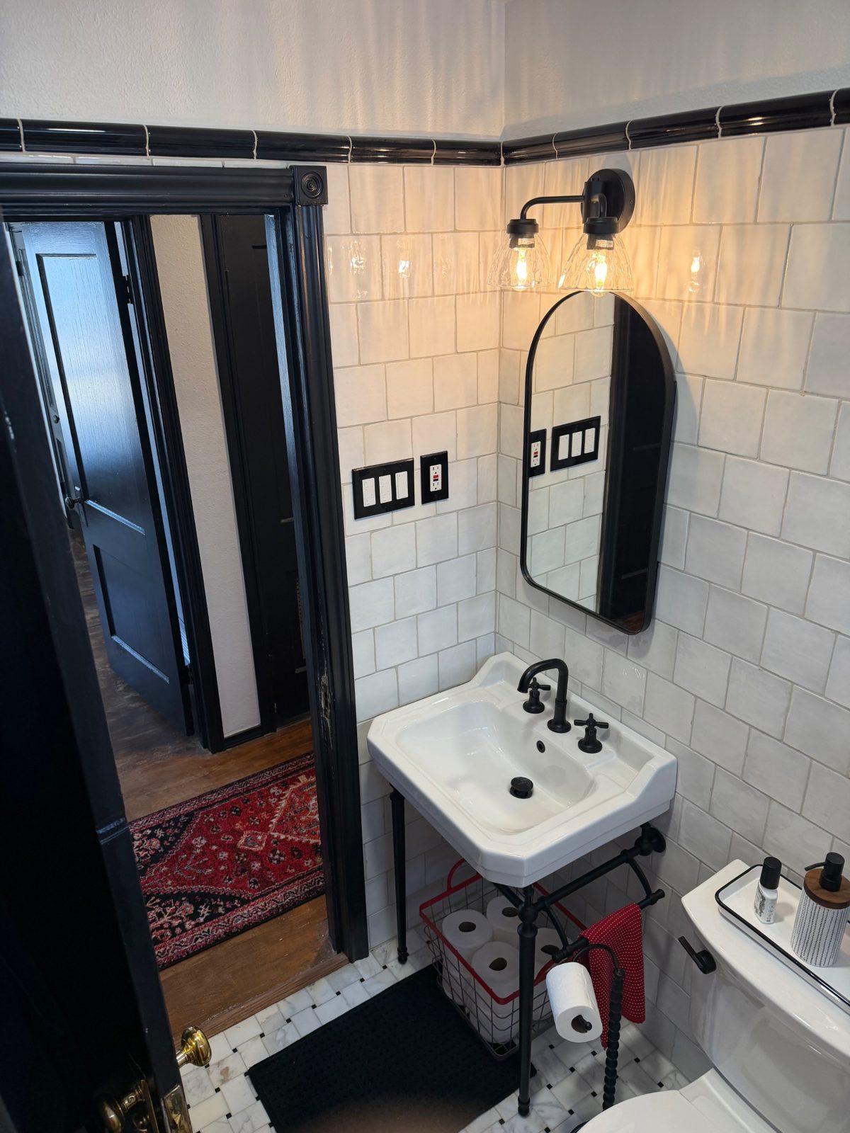 Front of the teal 28th Street house with a walkway to the porch — Bathroom